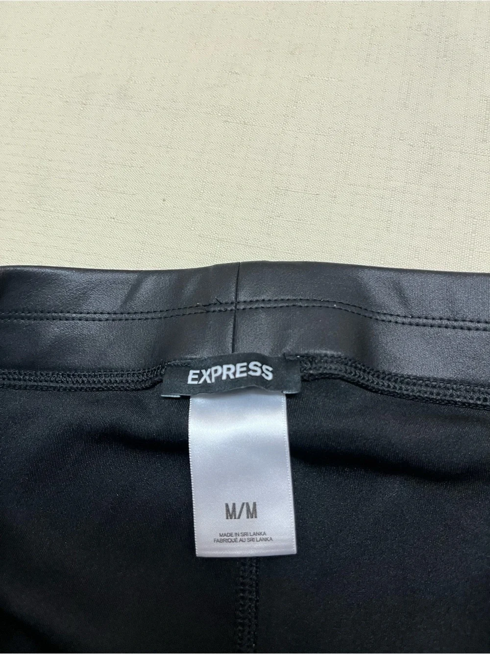 Express M black faux leather leggings